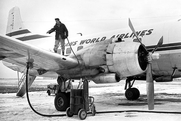 man on aircraft wing