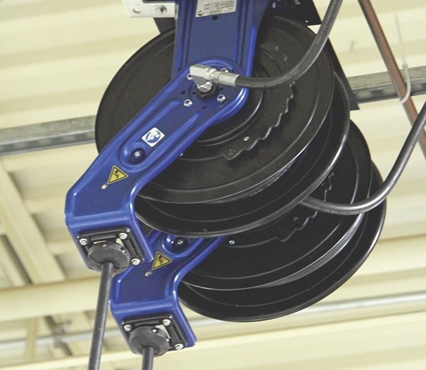 Hose reel systems for train services